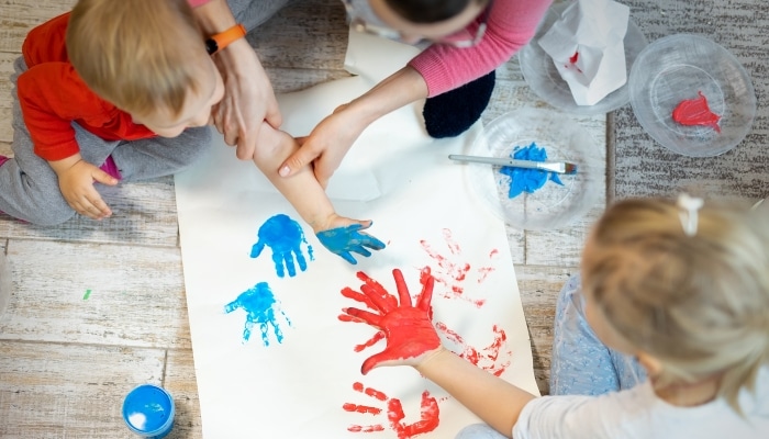 What skills do children get from finger painting?