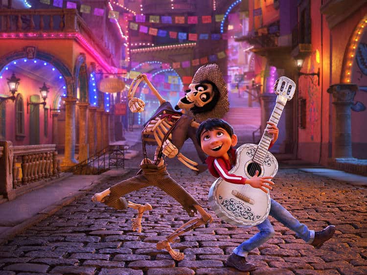 Two skeletal characters in the movie 'Coco' strumming guitars, adding a musical touch to the animated film