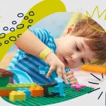 A boy engrossed in building with Legos during an Educational and Fun Party Activities.