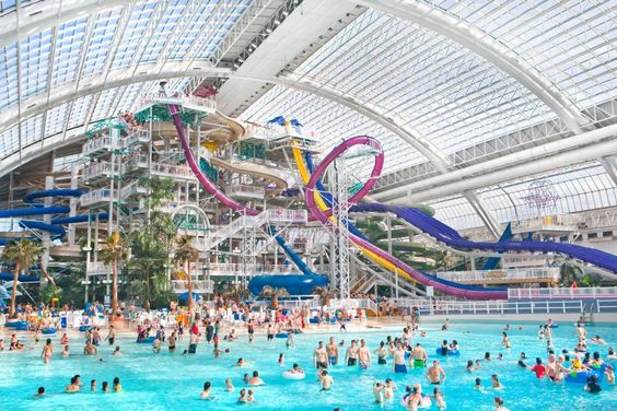 Experience the excitement of a vast indoor water park, complete with thrilling slides and attractions, ensuring accessibility for all