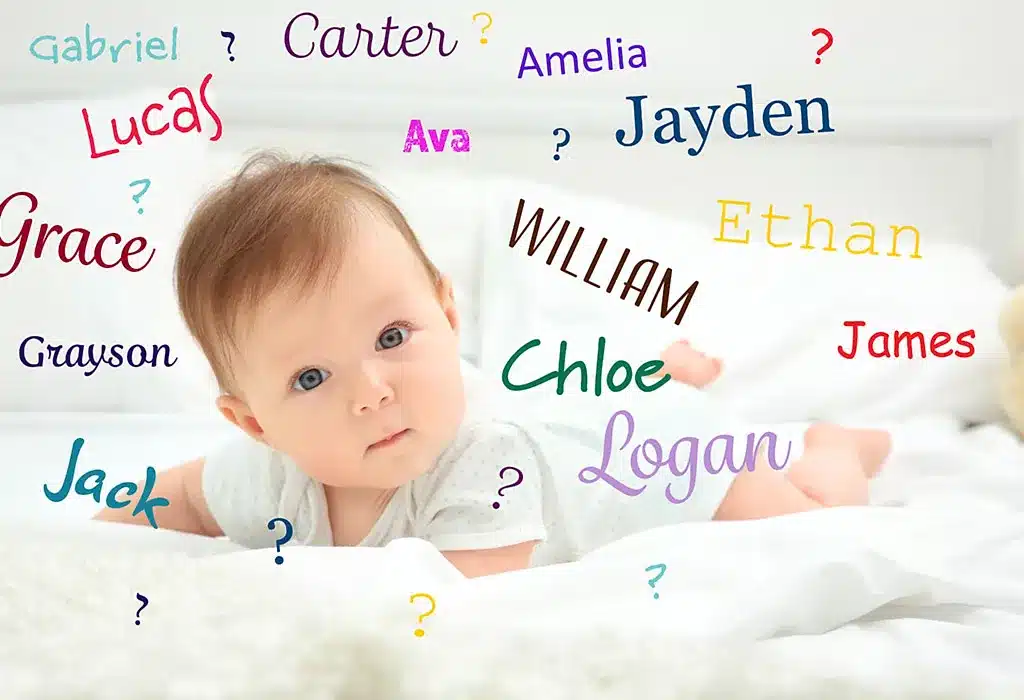 A baby on a bed with names written on it