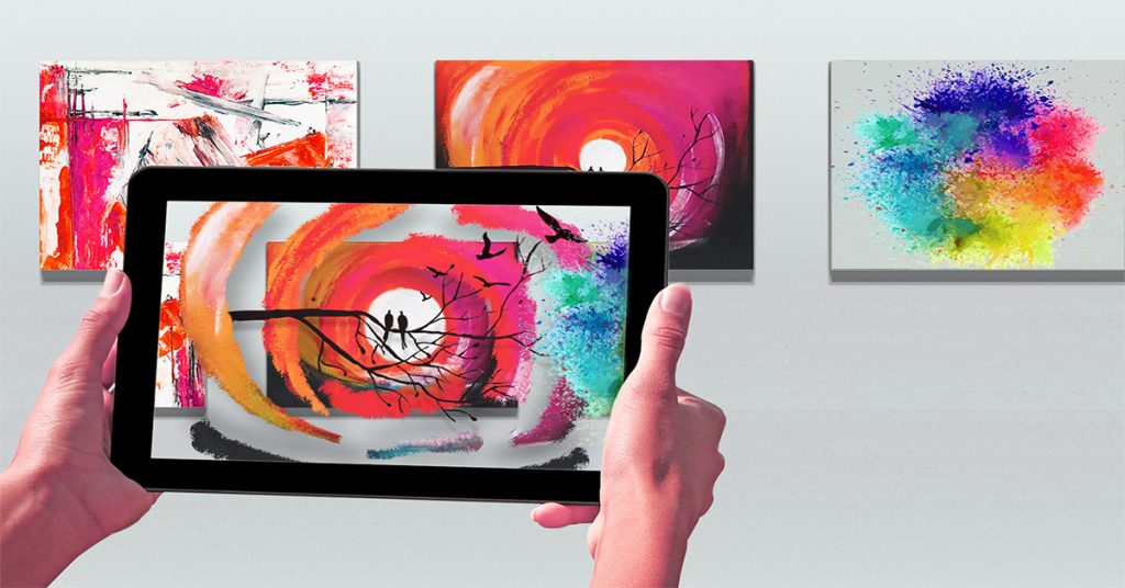 A person showcasing an augmented reality art piece on a tablet