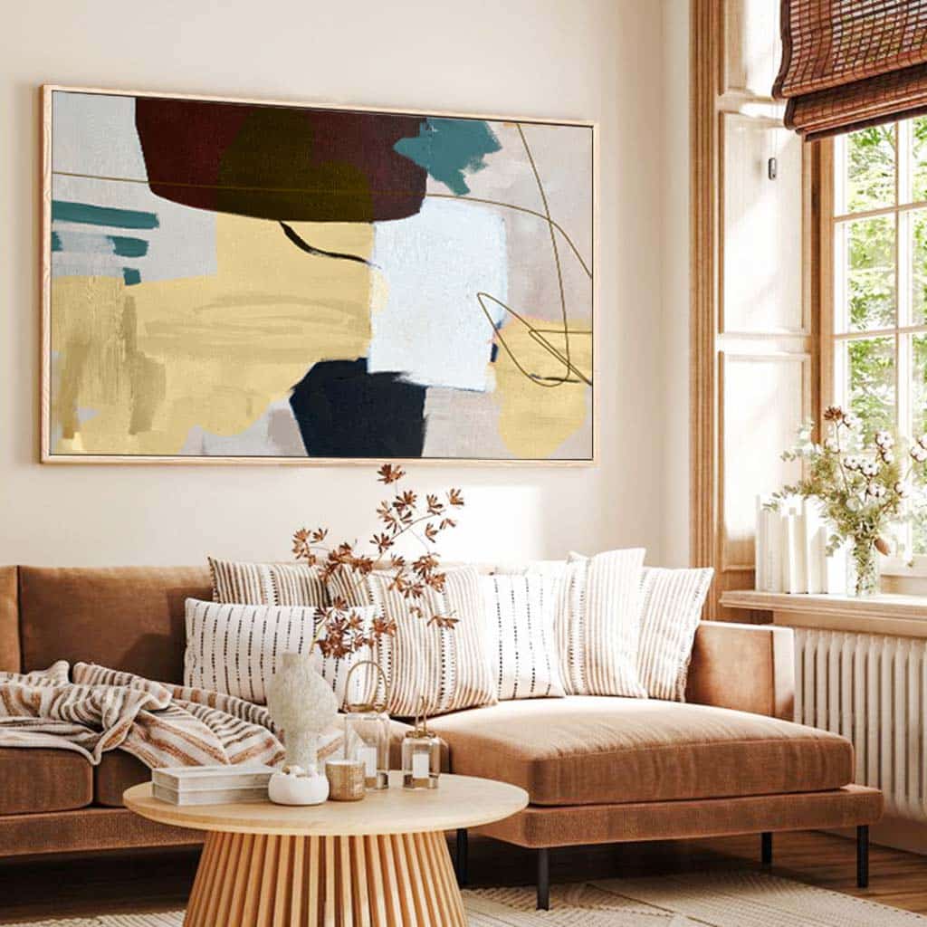 A captivating abstract painting adorns the living room wall, adding a touch of elegance to the space
